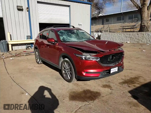 2020 Mazda CX-5 Grand Touring with VIN JM3KFBDM9L1820907, listed as a Copart auction lot 86166054 with 34,007 mi miles and Salvage Title. Bid and sale history available at carsss.com. Image 11.