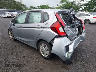 2017 Honda Fit LX with VIN 3HGGK5G53HM700502, listed as a IAAI auction lot 40777067 with 95,827 mi miles and . Bid and sale history available at DreamBid. Image 3.