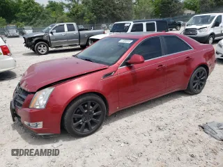 2009 Cadillac CTS AWD z VIN 1G6DT57V690102233, wystawiony jako Copart lot #57085815 z przebiegiem 152 020 mil mil oraz Szkoda całkowita • Salvage title. Historia ofert i sprzedaży dostępna na DreamBid. Obrazek 1.