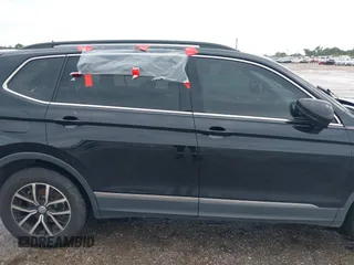 2021 Volkswagen Tiguan SE z VIN 3VV3B7AX7MM004286, wystawiony jako IAAI lot #39864219 z przebiegiem 67 429 mil mil oraz . Historia ofert i sprzedaży dostępna na DreamBid. Obrazek 13.