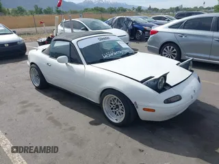 1992 Mazda MX-5 Miata z VIN JM1NA3513N0308521, wystawiony jako IAAI lot #42225665 z przebiegiem 235 947 mil mil oraz . Historia ofert i sprzedaży dostępna na DreamBid. Obrazek 1.