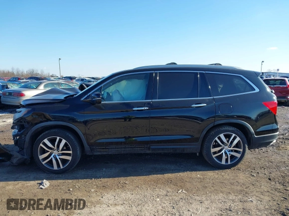 2016 Honda Pilot Elite with VIN 5FNYF6H01GB050524, listed as a IAAI auction lot 41452563 with 140,326 mi miles. Bid and sale history available at carsss.com. Image 14.