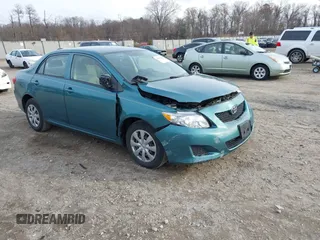 2009 Toyota Corolla with VIN JTDBL40E29J017358, listed as a IAAI auction lot 41041604 with 233,205 mi miles. Bid and sale history available at carsss.com. Image 1.