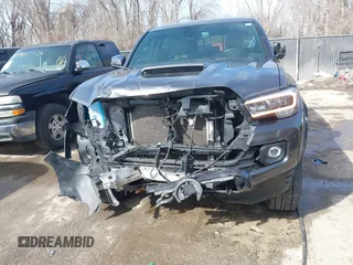 2021 Toyota Tacoma SR z VIN 3TMCZ5AN0MM392247, wystawiony jako IAAI lot #41645989 z przebiegiem 48 029 mil mil oraz . Historia ofert i sprzedaży dostępna na DreamBid. Obrazek 13.