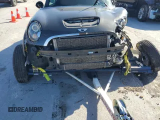 2012 MINI Convertible S with VIN WMWZP3C58CT296381, listed as a Copart auction lot 50834655 with 111,228 mi miles and Salvage Title. Bid and sale history available at DreamBid. Image 12.