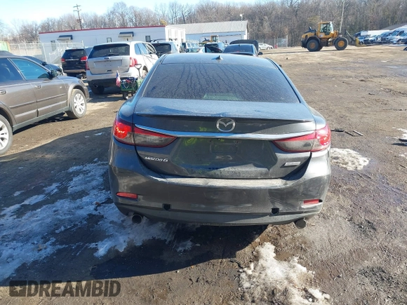 2014 Mazda 6 i Grand Touring with VIN JM1GJ1W67E1137886, listed as a IAAI auction lot 41405112 with 159,879 mi miles and . Bid and sale history available at DreamBid. Image 16.