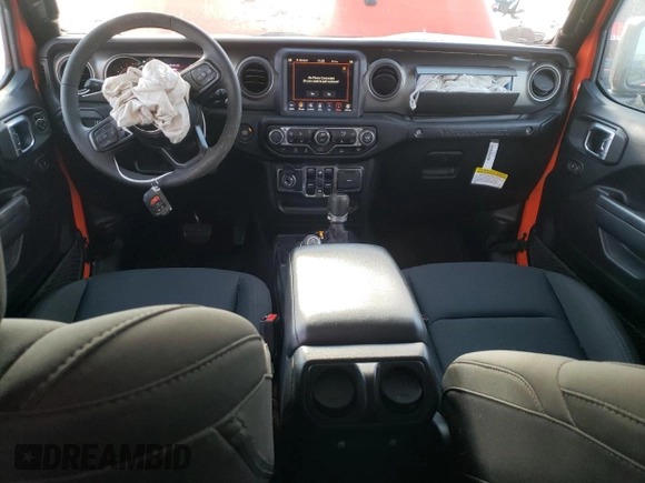2023 Jeep Wrangler Sport with VIN 1C4HJXDG8PW687459, listed as a Copart auction lot 87302924 with 16,637 mi miles and Salvage Title. Bid and sale history available at DreamBid. Image 8.