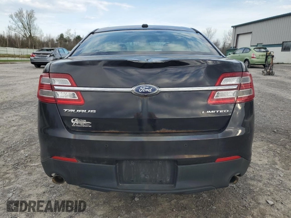 2014 Ford Taurus Limited z VIN 1FAHP2F85EG151167, wystawiony jako Copart lot #54376275 z przebiegiem 136 612 mil mil oraz Szkody całkowita. Historia ofert i sprzedaży dostępna na DreamBid. Obrazek 6.