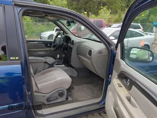 2003 GMC Envoy SLE z VIN 1GKDS13S432414698, wystawiony jako IAAI lot #42338640 z przebiegiem 210 988 mil mil oraz . Historia ofert i sprzedaży dostępna na DreamBid. Obrazek 5.