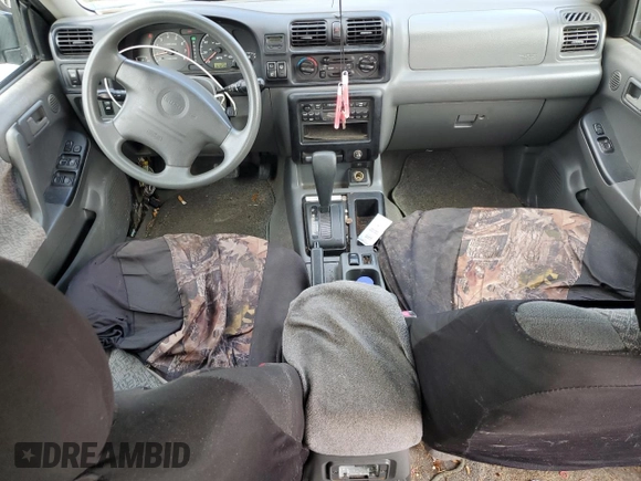 2001 Isuzu Rodeo S with VIN 4S2CK58W214338866, listed as a Copart auction lot 85280494 with 57,279 mi miles and Clean title. Bid and sale history available at DreamBid. Image 8.