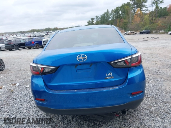 2016 Scion iA with VIN 3MYDLBZV2GY138644, listed as a IAAI auction lot 40790811 with 87,445 mi miles. Bid and sale history available at carsss.com. Image 16.