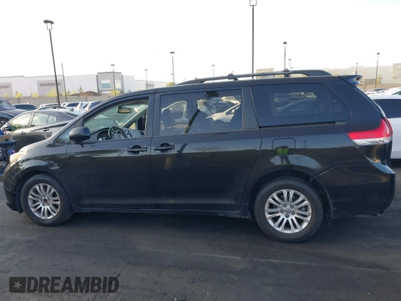 2013 Toyota Sienna XLE AAS with VIN 5TDYK3DC2DS292627, listed as a IAAI auction lot 41953059 with 186,007 mi miles and . Bid and sale history available at DreamBid. Image 14.