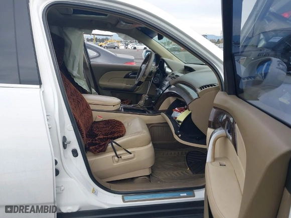 2012 Acura MDX with VIN 2HNYD2H27CH509988, listed as a IAAI auction lot 40965192 with 171367 miles. Bid and sale history available at carsss.com. Image 5.