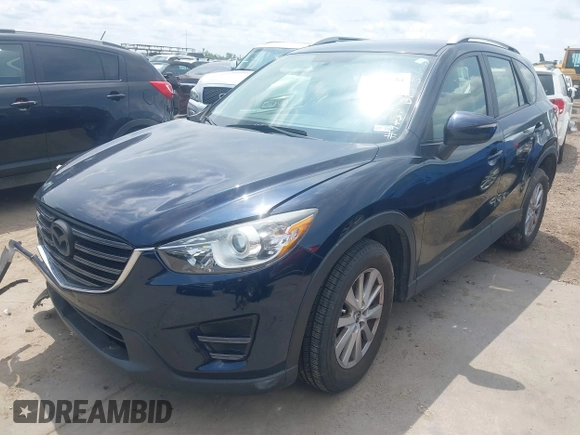 2016 Mazda CX-5 Sport z VIN JM3KE2BY0G0633611, wystawiony jako IAAI lot #42390654 z przebiegiem Nie podano mil oraz . Historia ofert i sprzedaży dostępna na DreamBid. Obrazek 18.