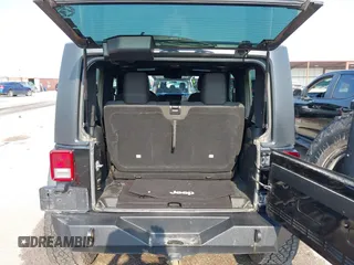 2017 Jeep Wrangler Sport with VIN 1C4AJWAG6HL654592, listed as a IAAI auction lot 42447379 with 61,585 mi miles and . Bid and sale history available at DreamBid. Image 18.