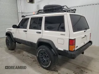 1996 Jeep Cherokee Sport with VIN 1J4FJ68S5TL235927, listed as a Copart auction lot 68942174 with 238,619 mi miles and Clean Title. Bid and sale history available at carsss.com. Image 2.