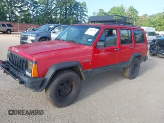 1996 Jeep Cherokee Sport with VIN 1J4FT68S4TL326973, listed as a IAAI auction lot 42744791 with 215,905 mi miles and . Bid and sale history available at DreamBid. Image 2.