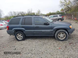 2003 Jeep Grand Cherokee Laredo with VIN 1J4GX48SX3C604904, listed as a IAAI auction lot 40884443 with 188,352 mi miles. Bid and sale history available at carsss.com. Image 13.