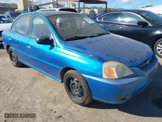 2003 Kia Rio with VIN KNADC125936239472, listed as a IAAI auction lot 41729536 with 156,421 mi miles. Bid and sale history available at carsss.com. Image 1.