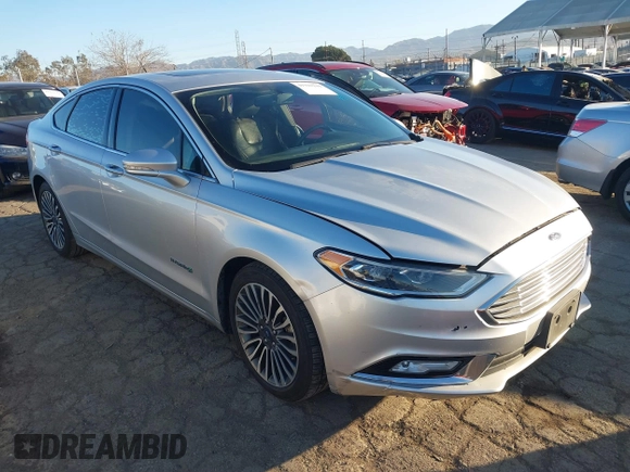 2017 Ford Fusion Hybrid Titanium with VIN 3FA6P0RU8HR190482, listed as a IAAI auction lot 41322244 with 137,539 mi miles and . Bid and sale history available at DreamBid. Image 1.