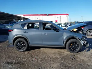 2023 Mazda CX-5 S Preferred with VIN JM3KFBCM6P0240348, listed as a IAAI auction lot 41503228 with 10,906 mi miles and . Bid and sale history available at carsss.com. Image 14.