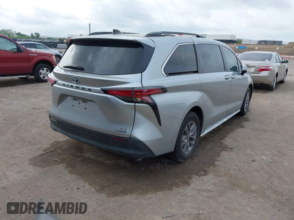 2021 Toyota Sienna XLE with VIN 5TDYRKEC9MS041334, listed as a IAAI auction lot 42145698 with 117,229 mi miles and . Bid and sale history available at DreamBid. Image 4.