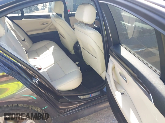 2014 BMW 5 Series 528i z VIN WBA5A5C59ED503028, wystawiony jako IAAI lot #42033479 z przebiegiem 93 335 mil mil oraz . Historia ofert i sprzedaży dostępna na DreamBid. Obrazek 8.