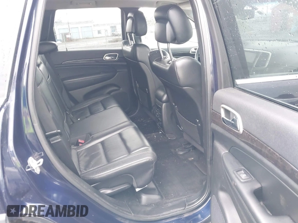 2012 Jeep Grand Cherokee Laredo with VIN 1C4RJFAG9CC220145, listed as a IAAI auction lot 41798457 with 130,603 mi miles. Bid and sale history available at carsss.com. Image 8.