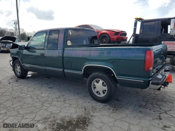 1998 GMC Sierra 1500 with VIN 2GTEC19R4W1506058, listed as a Copart auction lot 49326755 with 135,766 mi miles and Salvage Title. Bid and sale history available at carsss.com. Image 2.