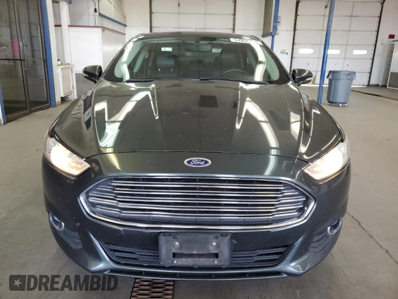 2015 Ford Fusion SE z VIN 3FA6P0H98FR295646, wystawiony jako Copart lot #57055105 z przebiegiem 121 515 mil mil oraz Szkoda całkowita • Salvage title. Historia ofert i sprzedaży dostępna na DreamBid. Obrazek 5.