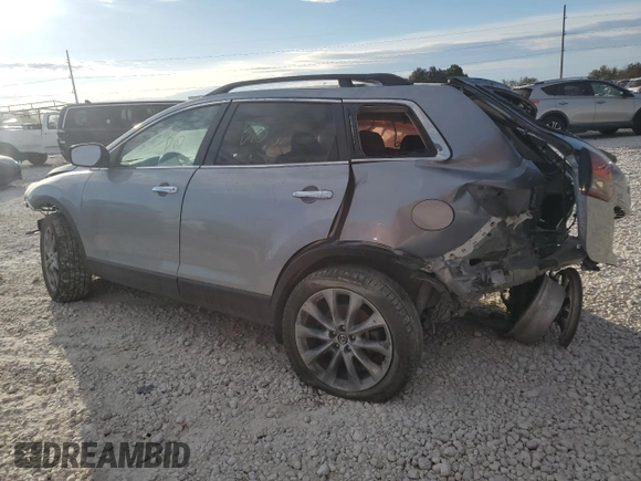 2015 Mazda CX-9 Grand Touring z VIN JM3TB2DA5F0468215, wystawiony jako Copart lot #53961975 z przebiegiem Nie podano mil oraz Szkoda całkowita • Salvage title. Historia ofert i sprzedaży dostępna na DreamBid. Obrazek 2.
