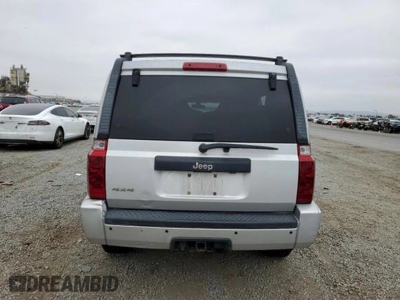 2010 Jeep Commander Sport with VIN 1J4RG4GK2AC121821, listed as a Copart auction lot 57793545 with 171,405 mi miles and Salvage title. Bid and sale history available at DreamBid. Image 6.