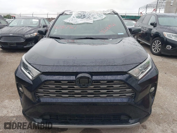 2021 Toyota RAV4 Hybrid XSE with VIN 2T3E6RFV5MW002856, listed as a IAAI auction lot 42387921 with Not provided miles and . Bid and sale history available at DreamBid. Image 11.