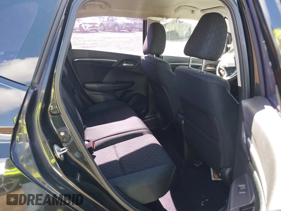 2015 Honda Fit LX z VIN 3HGGK5H51FM775176, wystawiony jako IAAI lot #41690648 z przebiegiem 49 979 mil mil oraz . Historia ofert i sprzedaży dostępna na DreamBid. Obrazek 8.