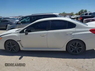 2017 Subaru WRX z VIN JF1VA1B61H9805299, wystawiony jako IAAI lot #42131611 z przebiegiem 85 505 mil mil oraz . Historia ofert i sprzedaży dostępna na DreamBid. Obrazek 14.