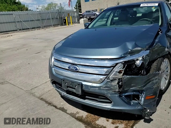 2012 Ford Fusion Hybrid z VIN 3FADP0L3XCR176552, wystawiony jako Copart lot #55787415 z przebiegiem 156 806 mil mil oraz Szkoda całkowita • Salvage title. Historia ofert i sprzedaży dostępna na DreamBid. Obrazek 13.