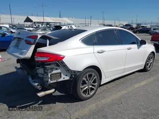 2019 Ford Fusion SEL with VIN 3FA6P0CD7KR134405, listed as a IAAI auction lot 41664755 with 119,158 mi miles. Bid and sale history available at carsss.com. Image 4.