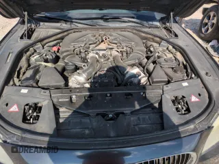 2011 BMW 7 Series 750i with VIN WBAKA8C59BCY36660, listed as a Copart auction lot 64260145 with 121,047 mi miles and Clean title. Bid and sale history available at DreamBid. Image 11.