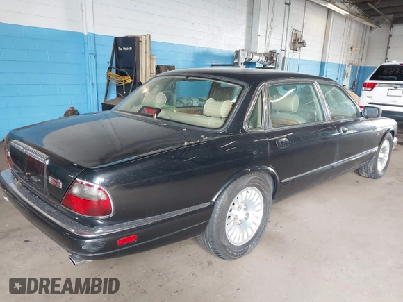 1997 Jaguar XJ Vanden Plas with VIN SAJKX6243VC800080, listed as a IAAI auction lot 42190859 with 192,979 mi miles and . Bid and sale history available at DreamBid. Image 4.