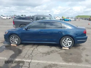 2018 Volkswagen Passat 2.0T SE with VIN 1VWBA7A30JC003243, listed as a IAAI auction lot 41895405 with 99,210 mi miles. Bid and sale history available at carsss.com. Image 14.