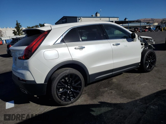 2021 Cadillac XT4 FWD Luxury z VIN 1GYAZAR49MF081955, wystawiony jako Copart lot #76611074 z przebiegiem 34 635 mil mil oraz Szkoda całkowita • Salvage title. Historia ofert i sprzedaży dostępna na DreamBid. Obrazek 3.