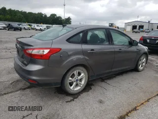 2013 Ford Focus SE with VIN 1FADP3F29DL207679, listed as a Copart auction lot 58322625 with 142,610 mi miles and Salvage title. Bid and sale history available at DreamBid. Image 3.