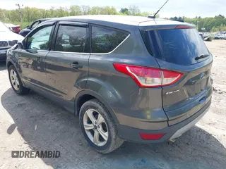 2016 Ford Escape SE z VIN 1FMCU9GX2GUA47702, wystawiony jako IAAI lot #42160145 z przebiegiem 90 765 mil mil oraz . Historia ofert i sprzedaży dostępna na DreamBid. Obrazek 3.