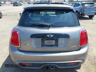 2017 MINI Hardtop Cooper S with VIN WMWXP7C34H2C61768, listed as a IAAI auction lot 42579522 with 67,876 mi miles and . Bid and sale history available at DreamBid. Image 17.