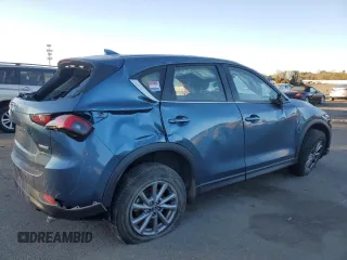 2023 Mazda CX-5 2.5 S with VIN JM3KFBAM5P0228761, listed as a Copart auction lot 42827995 with 0 mi miles and Salvage Title. Bid and sale history available at carsss.com. Image 3.