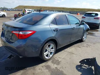 2014 Toyota Corolla L with VIN 5YFBURHE5EP005970, listed as a IAAI auction lot 42131661 with 115,840 mi miles and . Bid and sale history available at DreamBid. Image 4.