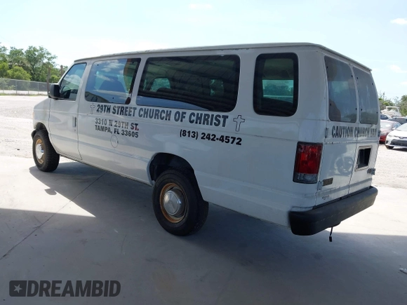 2003 Ford Econoline Passenger XL with VIN 1FBSS31L93HB99802, listed as a IAAI auction lot 42137197 with 56,656 mi miles. Bid and sale history available at carsss.com. Image 3.