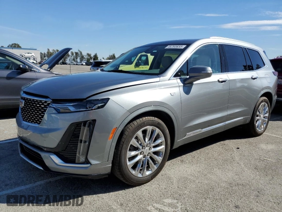 2023 Cadillac XT6 FWD Premium Luxury z VIN 1GYKPCRS5PZ212337, wystawiony jako Copart lot #46283655 z przebiegiem 15 660 mil mil oraz Szkody całkowita. Historia ofert i sprzedaży dostępna na DreamBid. Obrazek 1.