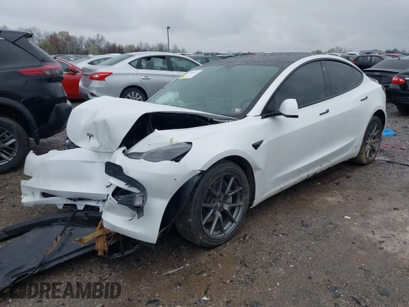 2022 Tesla Model 3 Long Range with VIN 5YJ3E1EB0NF129945, listed as a IAAI auction lot 41965531 with 59,162 mi miles and . Bid and sale history available at DreamBid. Image 17.