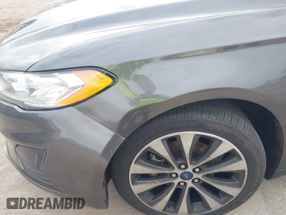 2020 Ford Fusion SE with VIN 3FA6P0T99LR173347, listed as a IAAI auction lot 42090457 with 118,359 mi miles and . Bid and sale history available at DreamBid. Image 6.